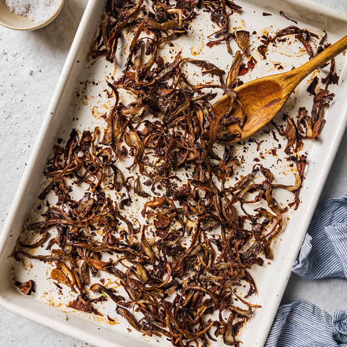 close up of one sheet pan with roasted mushrooms.