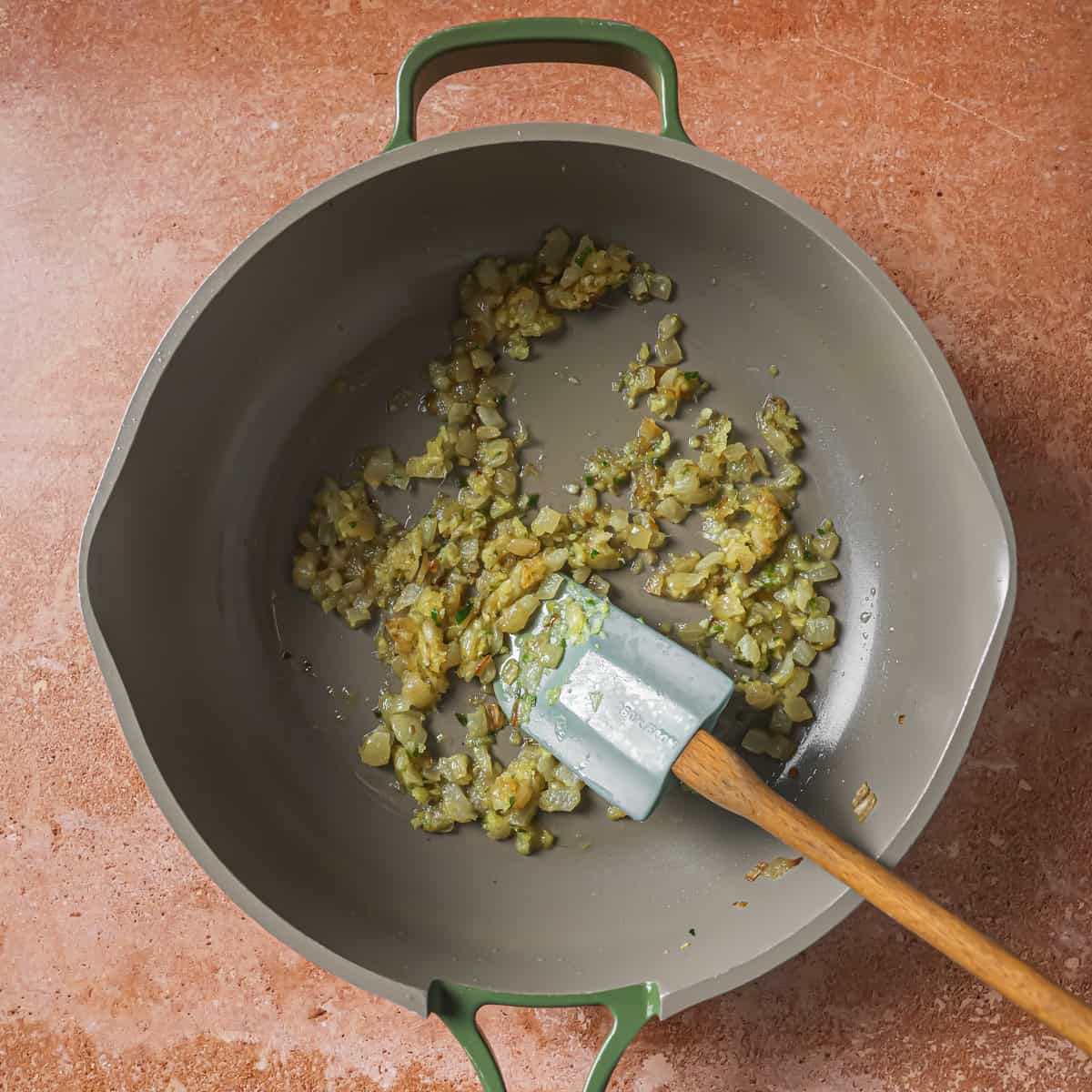 aromatics sauteing in a pan.