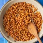 tempeh nuggets in a skiller on a table.