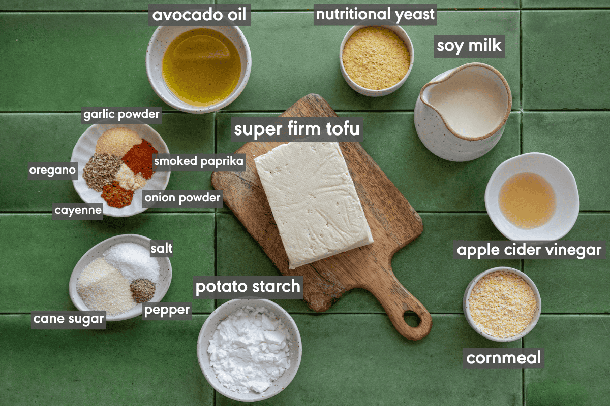 crispy tofu tenders ingredients in various small bowls on a table.