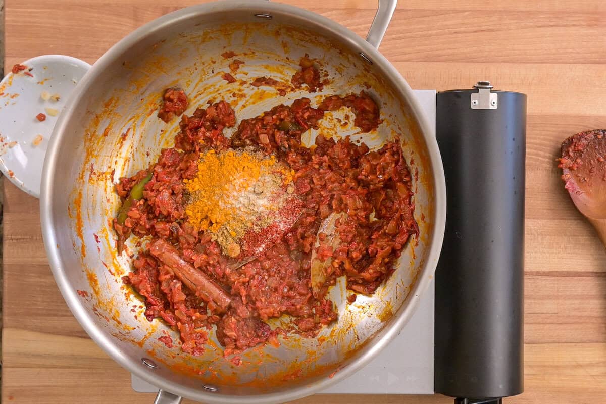 cooked tomato mixture with ground spices added.