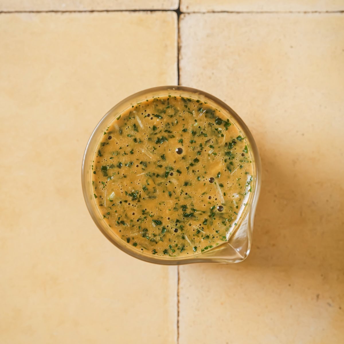 salad dressing in a food processor before after blended.