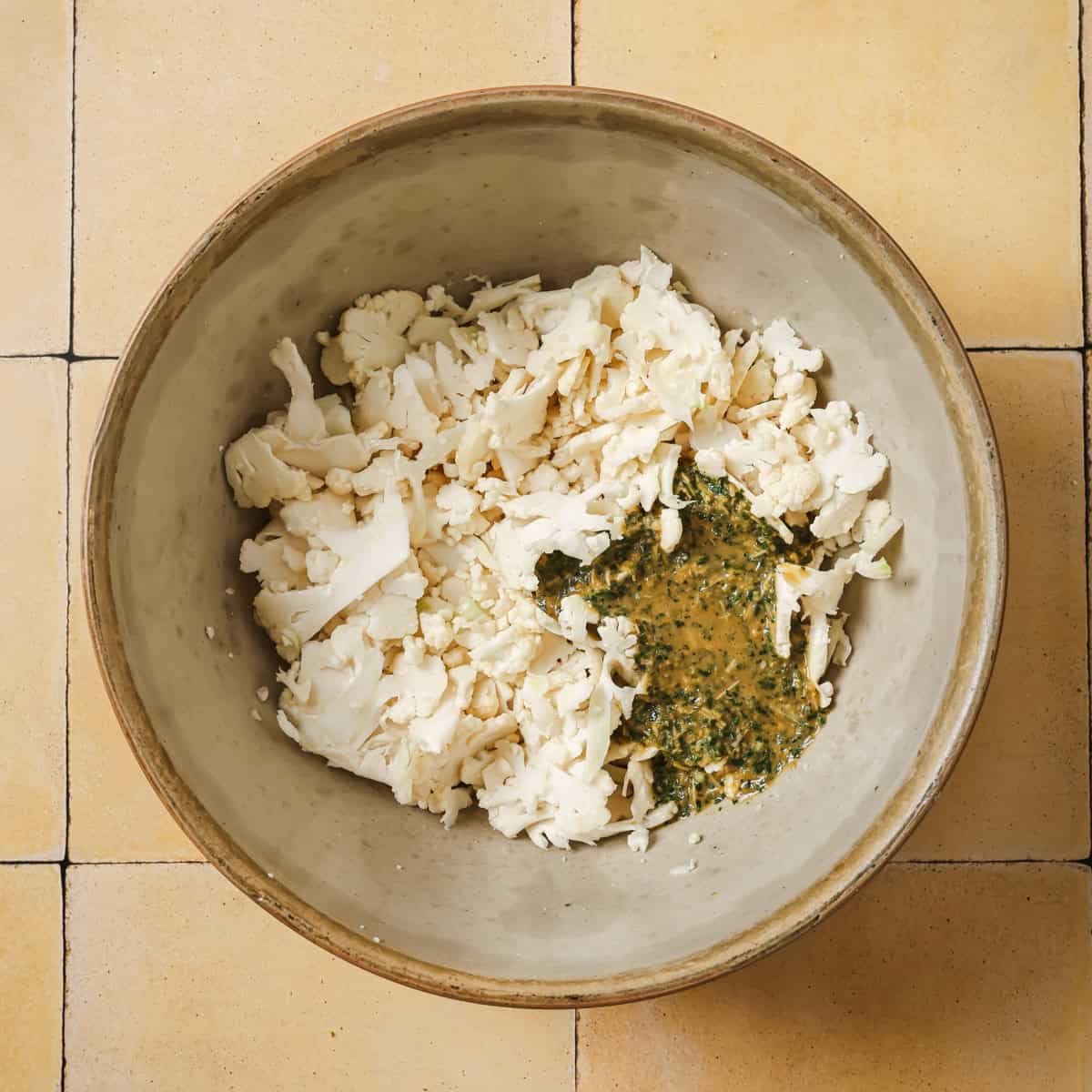 dressing on top of the shaved cauliflower before they're tossed together.