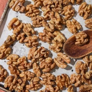 baking sheet with roasted walnuts.