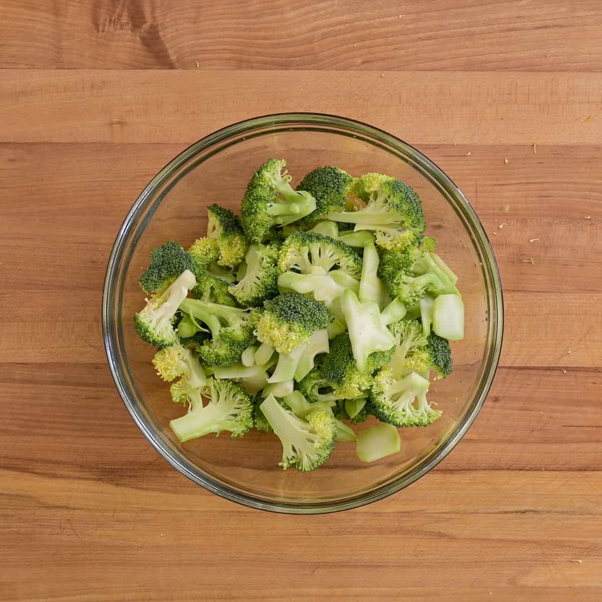 broccoli florets in bowl before being steamed.