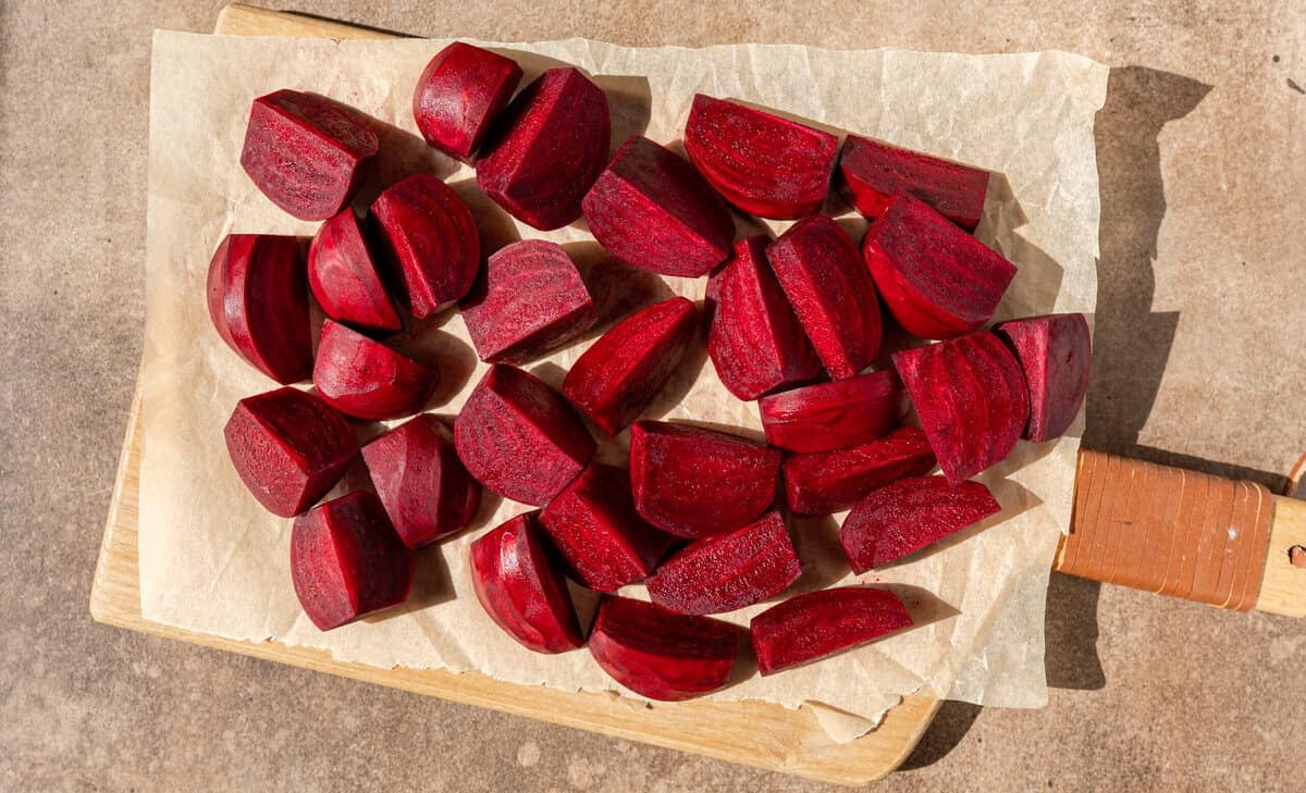 quartered beets on a piece of parchment paper.