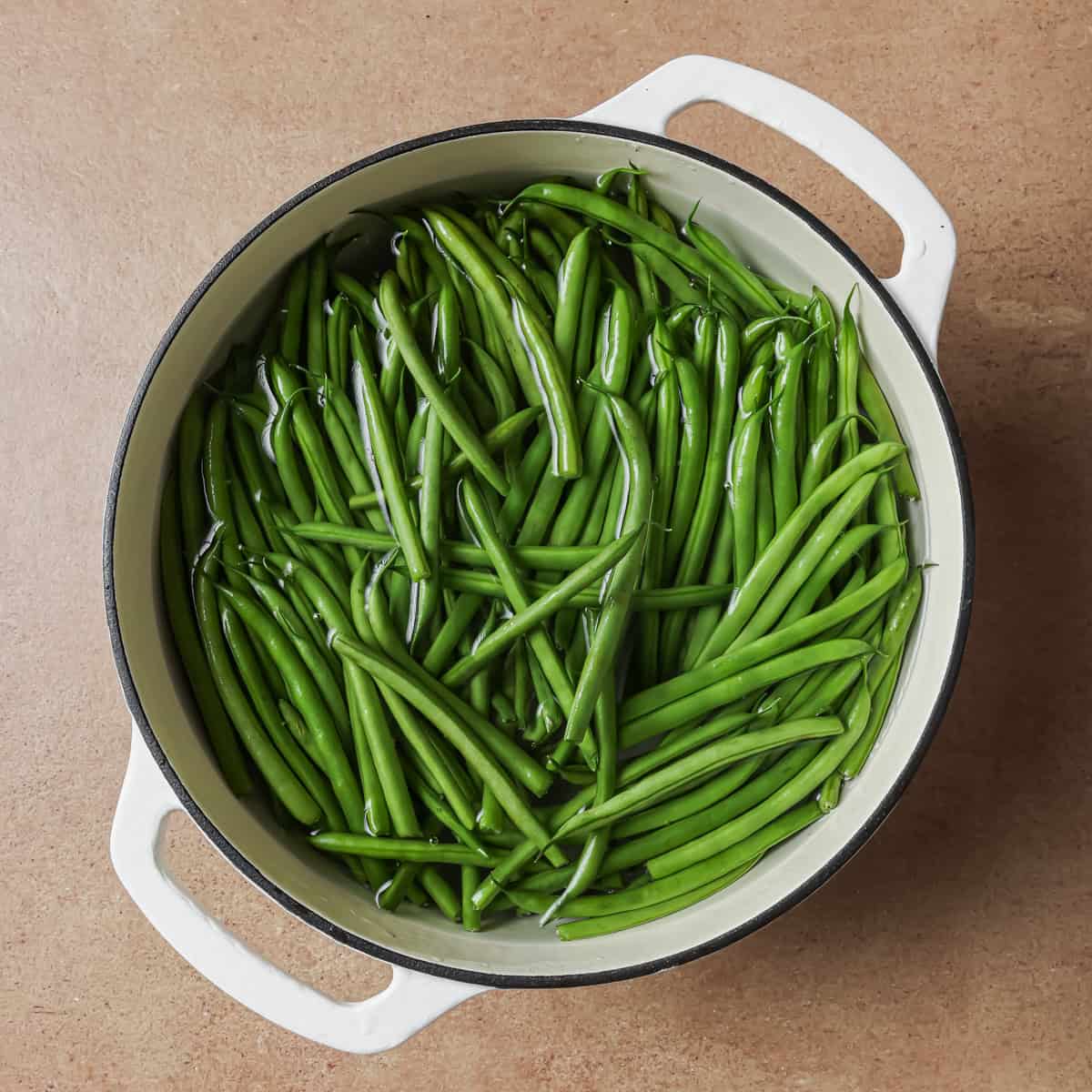 green beans boiling in a pot.