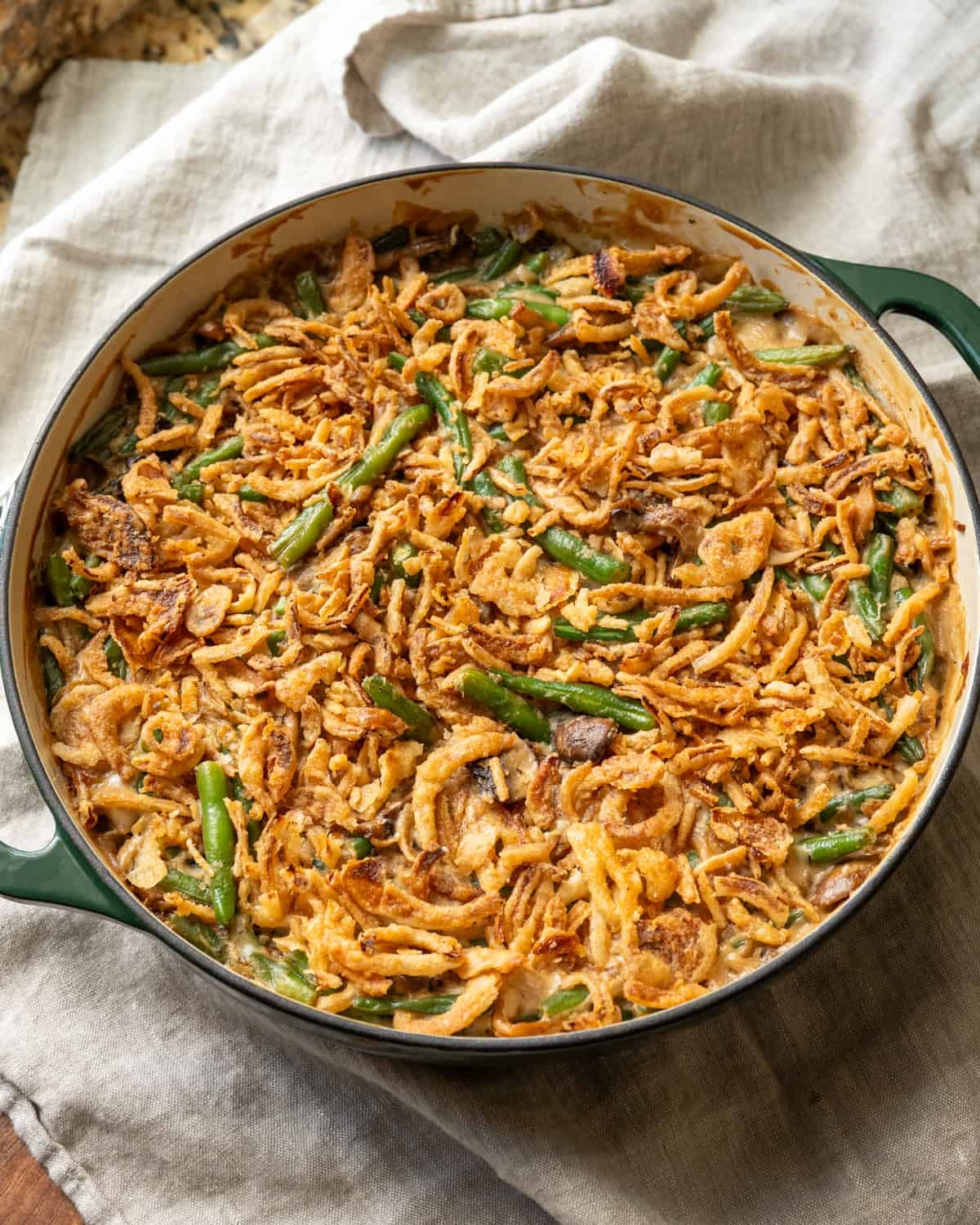 overhead view of green bean casserole in a large deep oven pan.