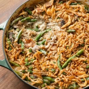 close up overhead shot of green bean casserole in baking dish.