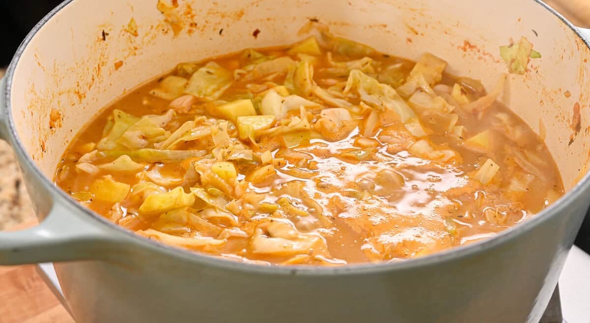 soup simmering in pot.